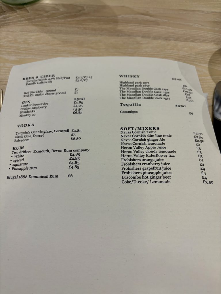 Drinks menu listing beer, cider, gin, vodka, rum, whisky, tequila and soft drinks
